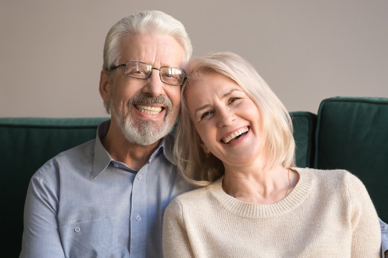 Happy couple enjoying the results of cosmetic teeth bonding in Florence, KY & Tri-State area