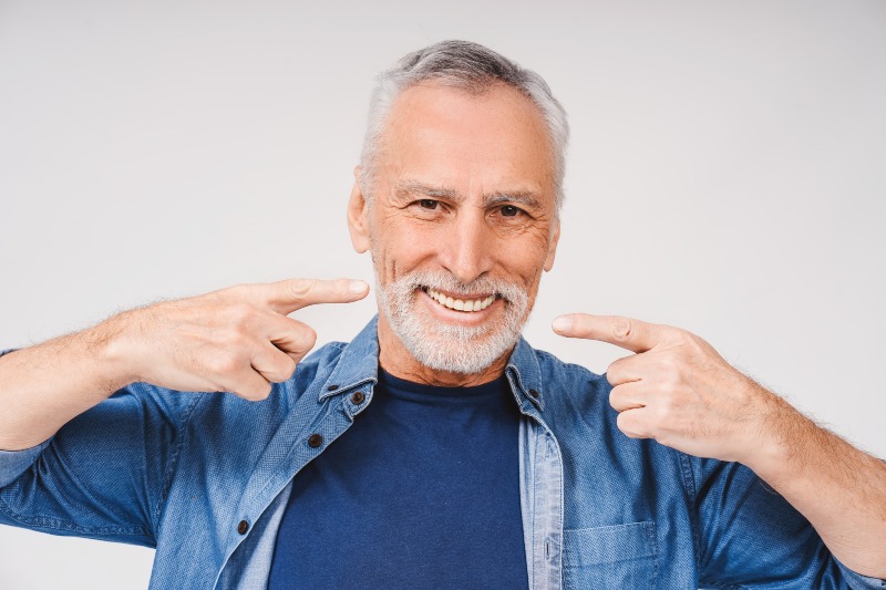 Tooth restored of a man with same-day dental crowns in Florence, KY & Tri-State area